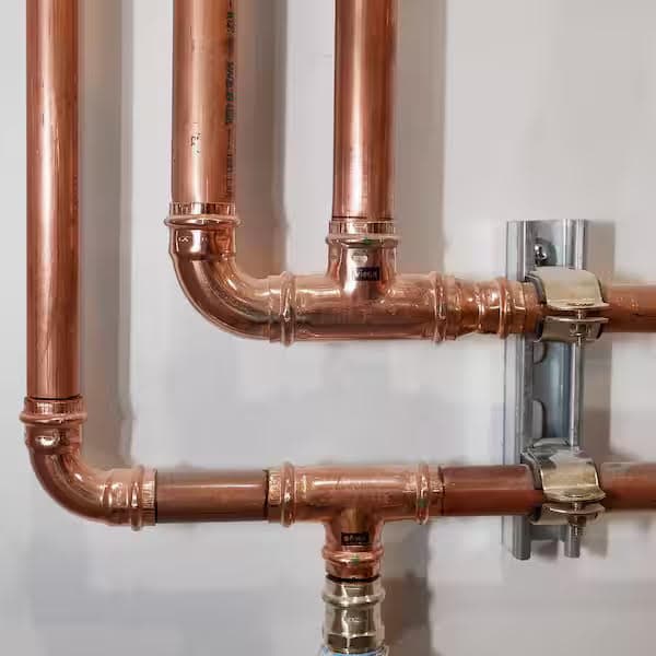 compressed air piping installation in an industrial facility